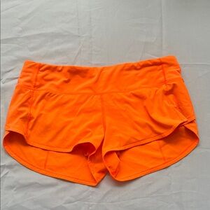 Lululemon bright Orange Shorts, size 6, speed up low rise